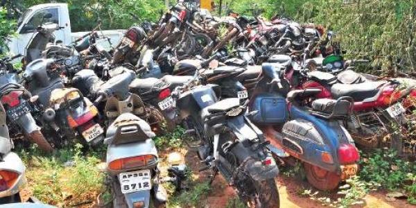 a-pile-of-junk-vehicles-at-the-police-station-amravati-mandal